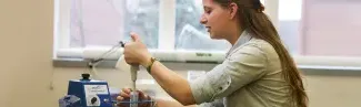 A student works in a biology lab